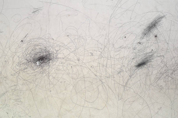 istock Kids drawing with a pencil on white background wall 1292428921
