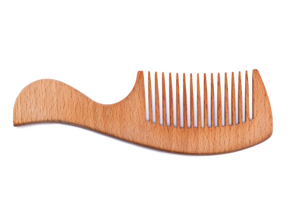 istock Wooden hair comb on white background. 1292431859