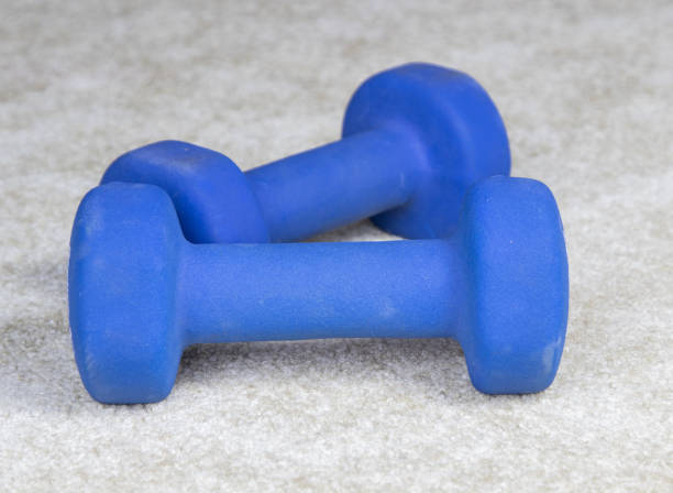 istock Rubber Coated Dumbbells on Floor 1292432956