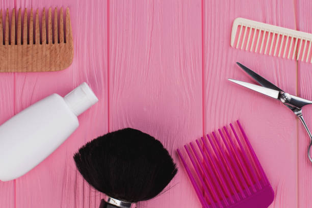 istock Various hairdresser tools on wooden table. 1292432958