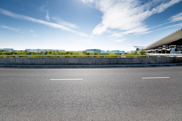 istock Empty asphalt road with buildings in the city 1292433278