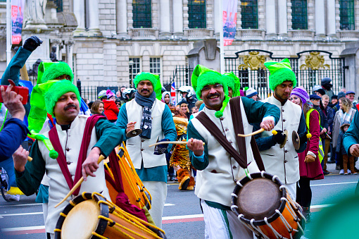 Belfast, Northern Ireland, UK, March 17, 2018. International group performing in the parade in front of Belfast City Hall during St. Patrick's celebration. Belfast, Northern Ireland, March, 17, 2018.