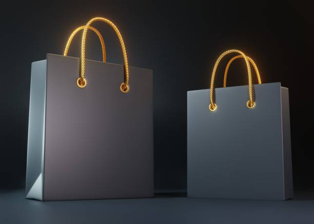 istock Empty black color shopping bag on the black background 1292443567