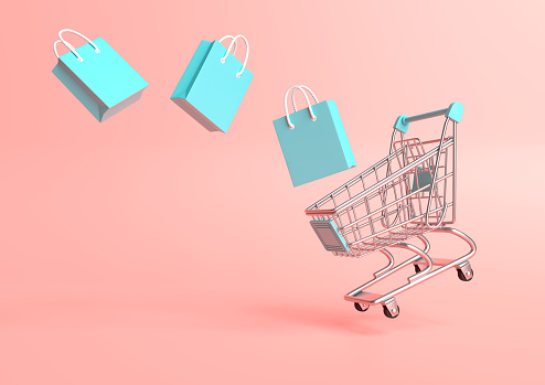 Flying Shopping Cart With Shopping Bags On A Pink Background Stock Photo -  Download Image Now - iStock