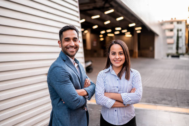 istock Portrait of two business persons 1292445375