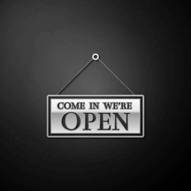 istock Silver Hanging sign with text Come in we're open icon isolated on black background. Business theme for cafe or restaurant. Long shadow style. Vector 1292447552