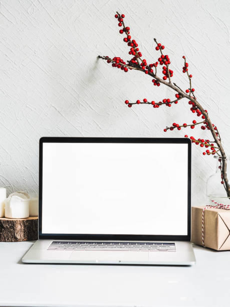 istock Laptop empty screen and season decoration against the white wall. 1292447951