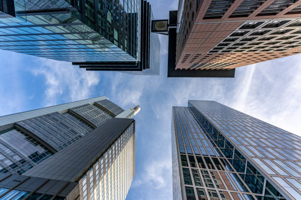 istock low angle view of four skyscrapers with different facade designs under the blue sky 1292449659