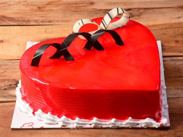 istock Freshly made strawberry cream cake on wooden table. selective focus 1292450161