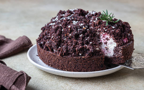 istock Homemade chocolate cake with cherry and whipped cream. Cake Mink mole or Mole hole cake. 1292451895
