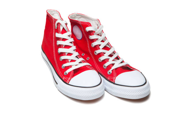 istock Red sport shoes isolated on white background 1292452680