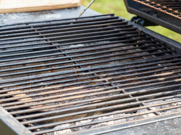 istock closeup of empty metal barbecue grill. Cooking tool 1292455114