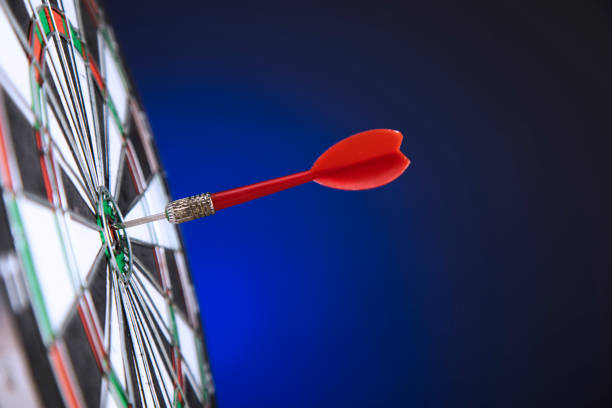 istock Darts arrows in the target center 1292458819
