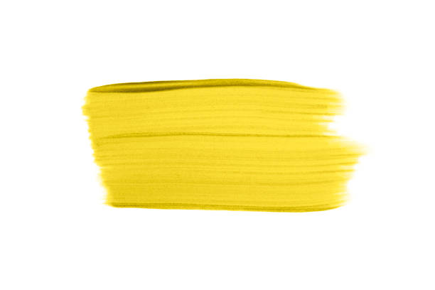 istock Big Rectangular Illuminating yellow brush strokes or smears isolated on white background. 1292460839