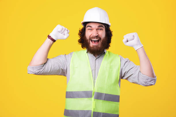 istock We made it, the best construction team. Bearded architect man celebrating success 1292461479