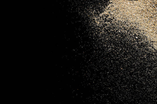 istock Heap dust beach texture on shore background. Pile desert sand isolated on black. Vacation backdrop with space for the text. 1292469644