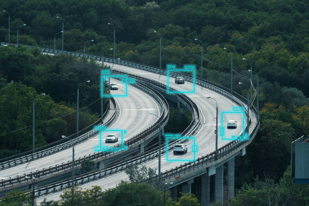 istock Cars move on city road and Artificial Intelligence controls vehicles in traffic. Autonomous Self Driving Cars Concept 1292471064