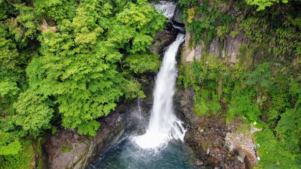 istock Waterfall tucked in Nature 1292475753