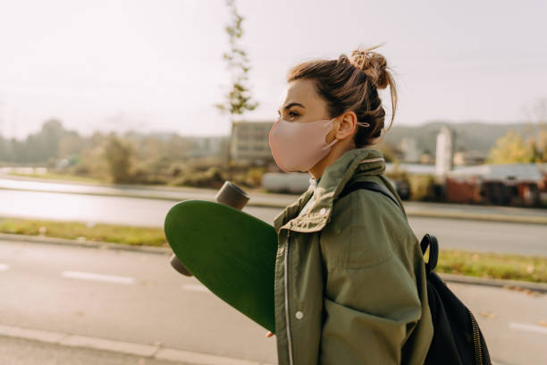 istock Cruising through the city on skateboard 1292477124