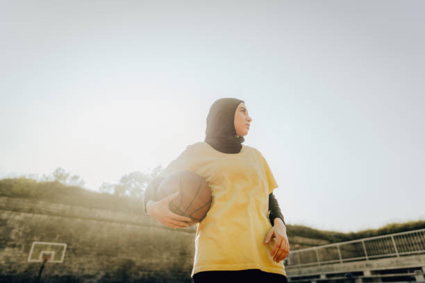 istock Sporty woman with a hijab 1292477156