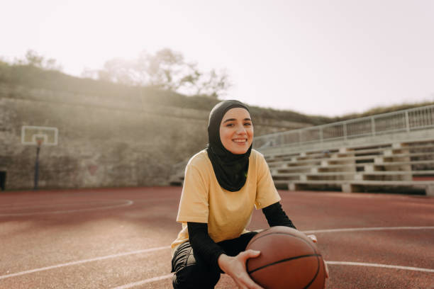 istock Sporty woman with a hijab 1292477272