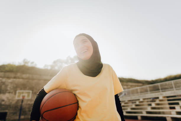 istock Sporty woman with a hijab 1292477329