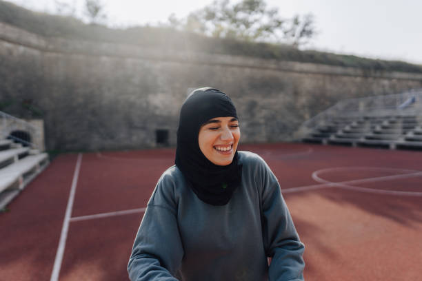 istock Sporty woman with a hijab 1292477348