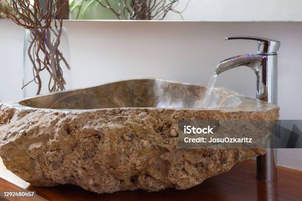 Water Running Into Original Stone Washbasin Stock Photo - Download Image Now - Apartment, Bathroom, Chile