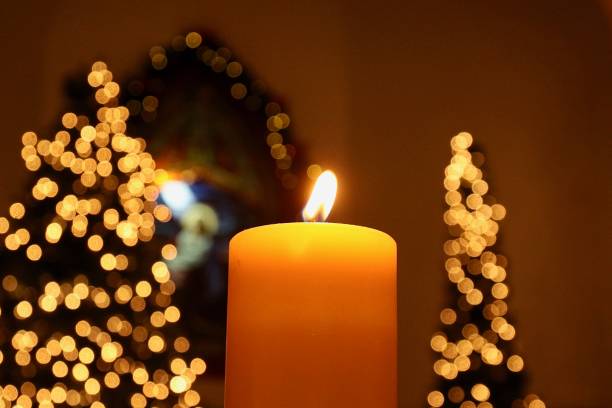 istock Single Candle In Church 1292483807