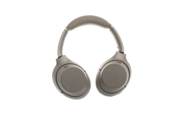 istock new modern gray wireless headphones, audio studio device isolated 1292485603