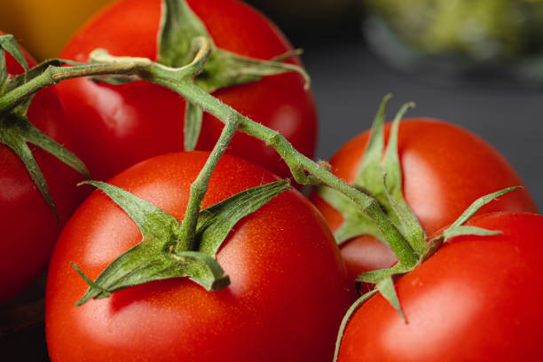 istock Close up of cherry tomatoes on kitchen table 1292490532