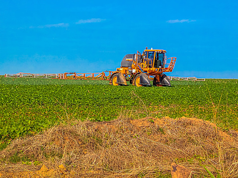 Agricultural Machine Spraying Soybean Plantation in Tapurah, Mato Grosso - Agribusiness