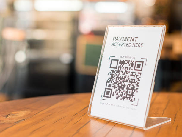 Restaurant with display for digital payment via QR code. stock photo