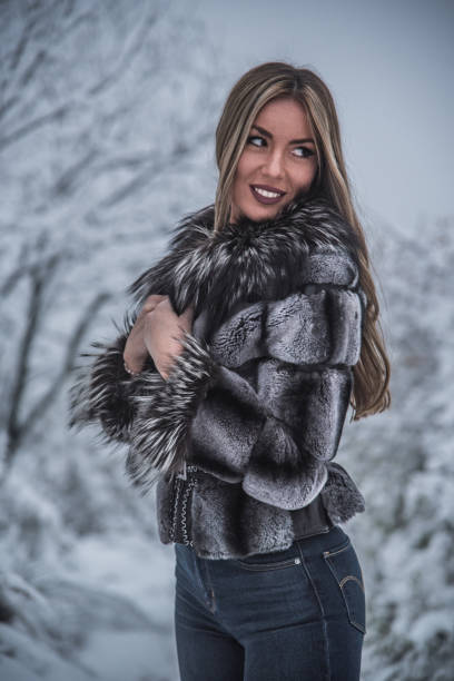 istock A beautiful girl posing on a snowy mountain 1292494327