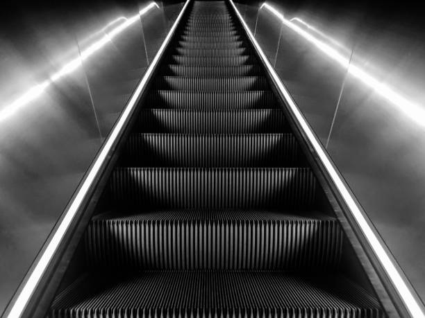 istock Close up of a escalator stairs lit by LED lights 1292495164