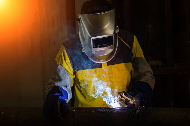istock Close up Industrial Worker at the factory welding . 1292501833