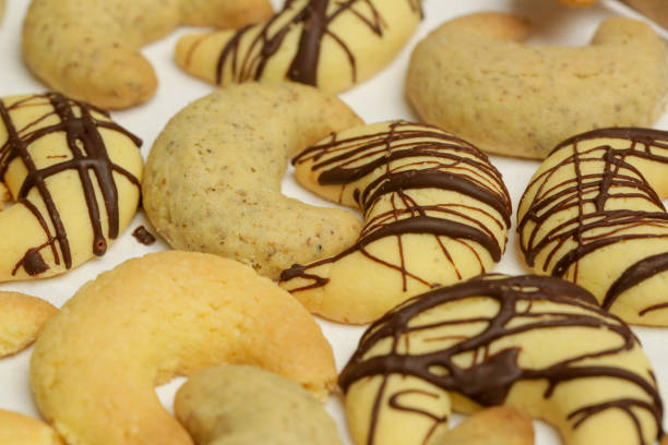 istock Small walnut, almond and chocolate crescent cookies 1292501896