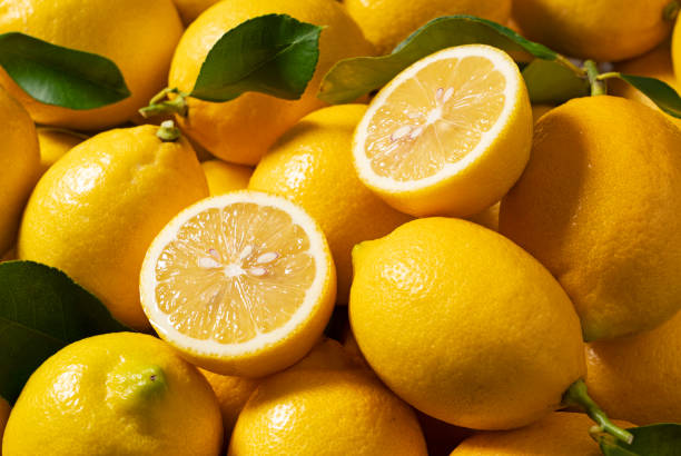 istock Lemons placed and cut all over the screen 1292503346