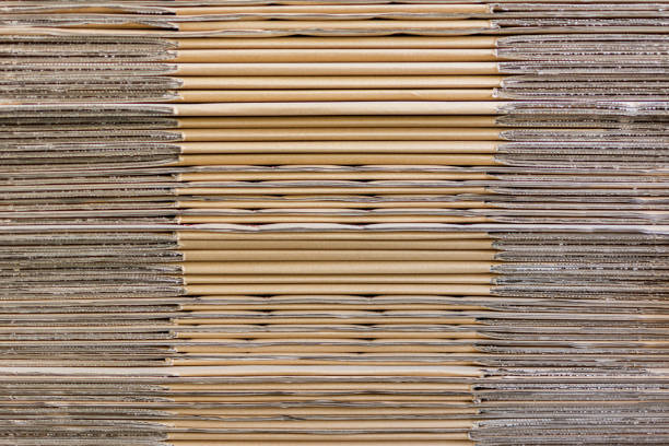 istock Pile of folded corrugated cardboard 1292510718