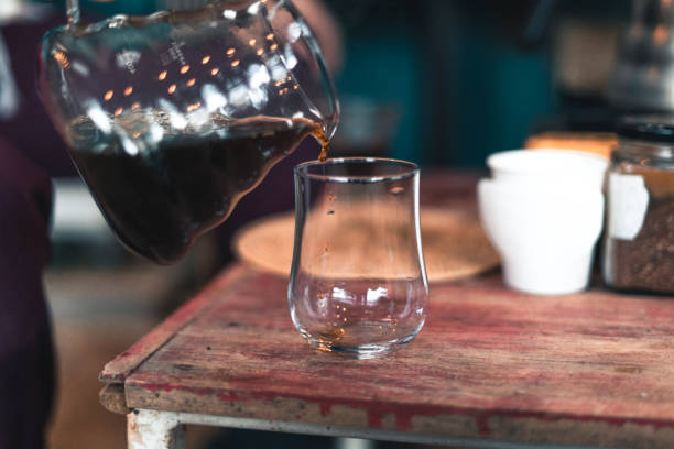 istock Drip coffee, barista pouring water on coffee ground with filter,brewing coffee 1292515007