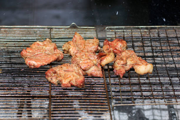 Roast pork, cooked and ready to eat on the grill.