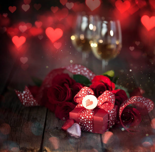 istock Valentine's Day Gift and White Wine on an Old Wood Rustic Background 1292517538