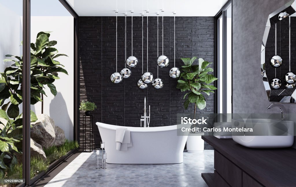 Modern bathroom with nature view stock photo Modern contemporary bathroom 3d render. There are gray concrete walls wall, gray tiles floor. The room has large windows. Looking out to see the garden view. Bathroom Stock Photo