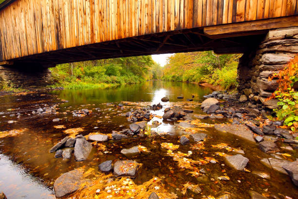 istock Corbin covered bridge over Sugar River in Newport, New Hampshire. 1292524849
