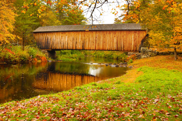 istock Corbin covered bridge over Sugar River in Newport, New Hampshire. 1292524880
