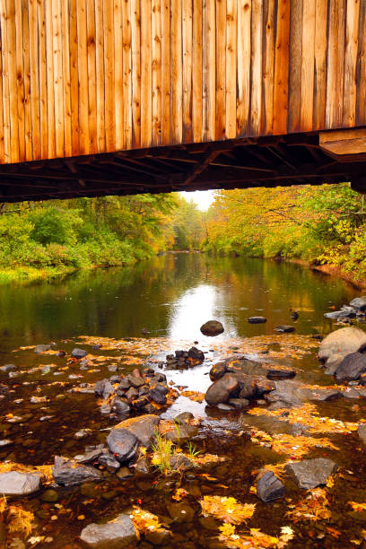 istock Corbin covered bridge over Sugar River in Newport, New Hampshire. 1292524905