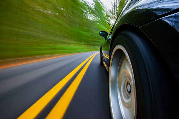 istock Sportscar Driving Speeding. 1292526597