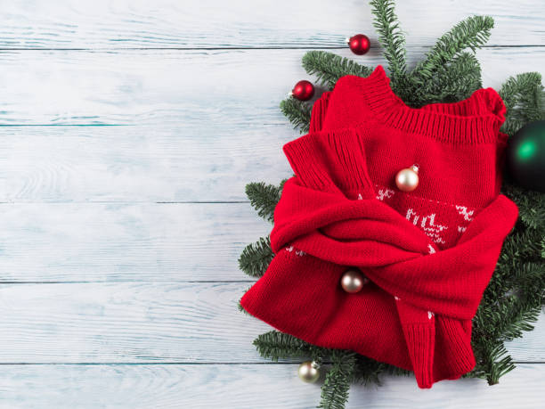 istock Red ugly christmas sweater with green ornament 1292528578