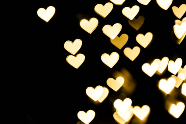 istock Golden heart bokeh background 1292529414