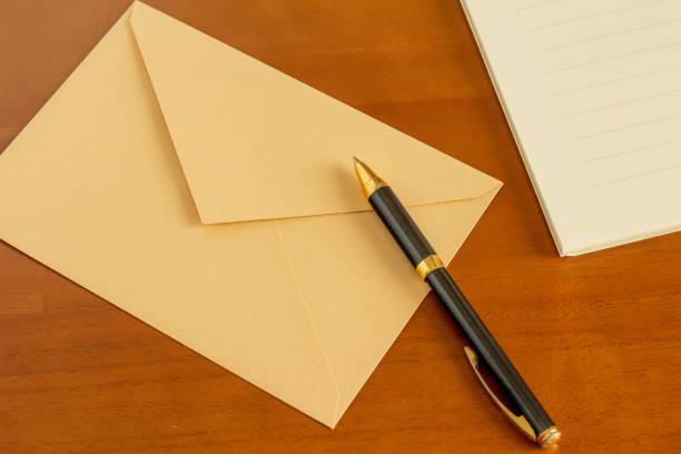 istock Envelopes and ballpoint pens for sending letters 1292532949